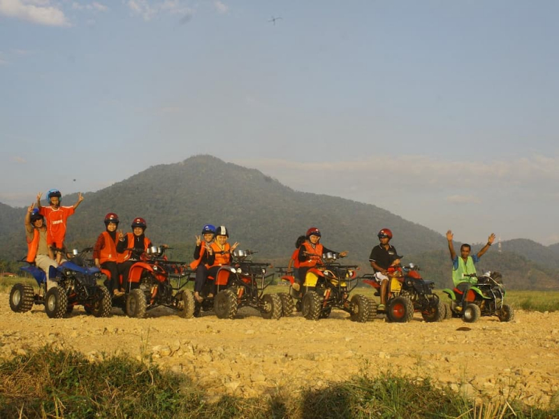 Tourists posing for photo at ATV Adventure Ride Langkawi